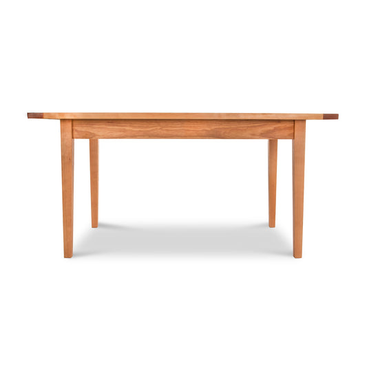 Vermont Shaker Harvest Extension Dining Table by Maple Corner Woodworks, showcasing its craftsmanship and design details.