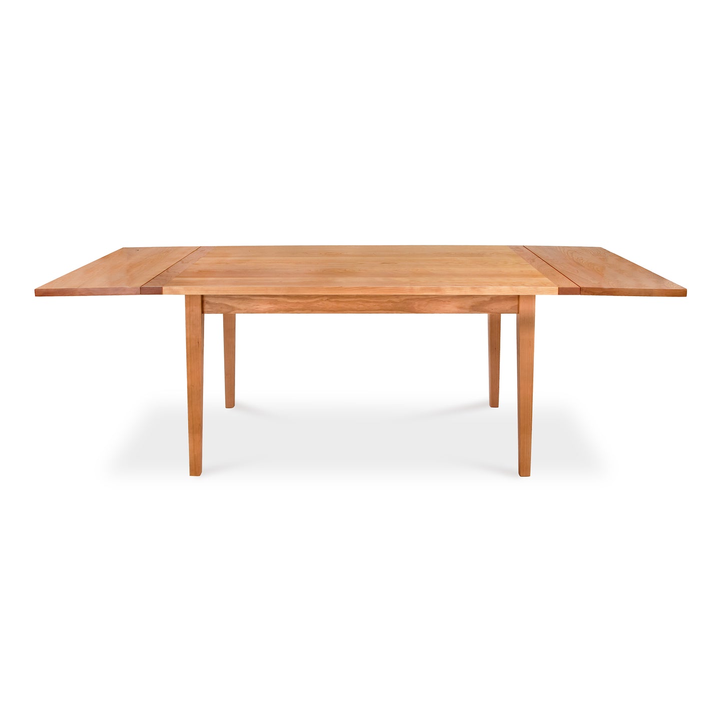 Maple Corner Woodworks Vermont Shaker Harvest Extension Dining Table, sustainably harvested woods, isolated on a white background.
