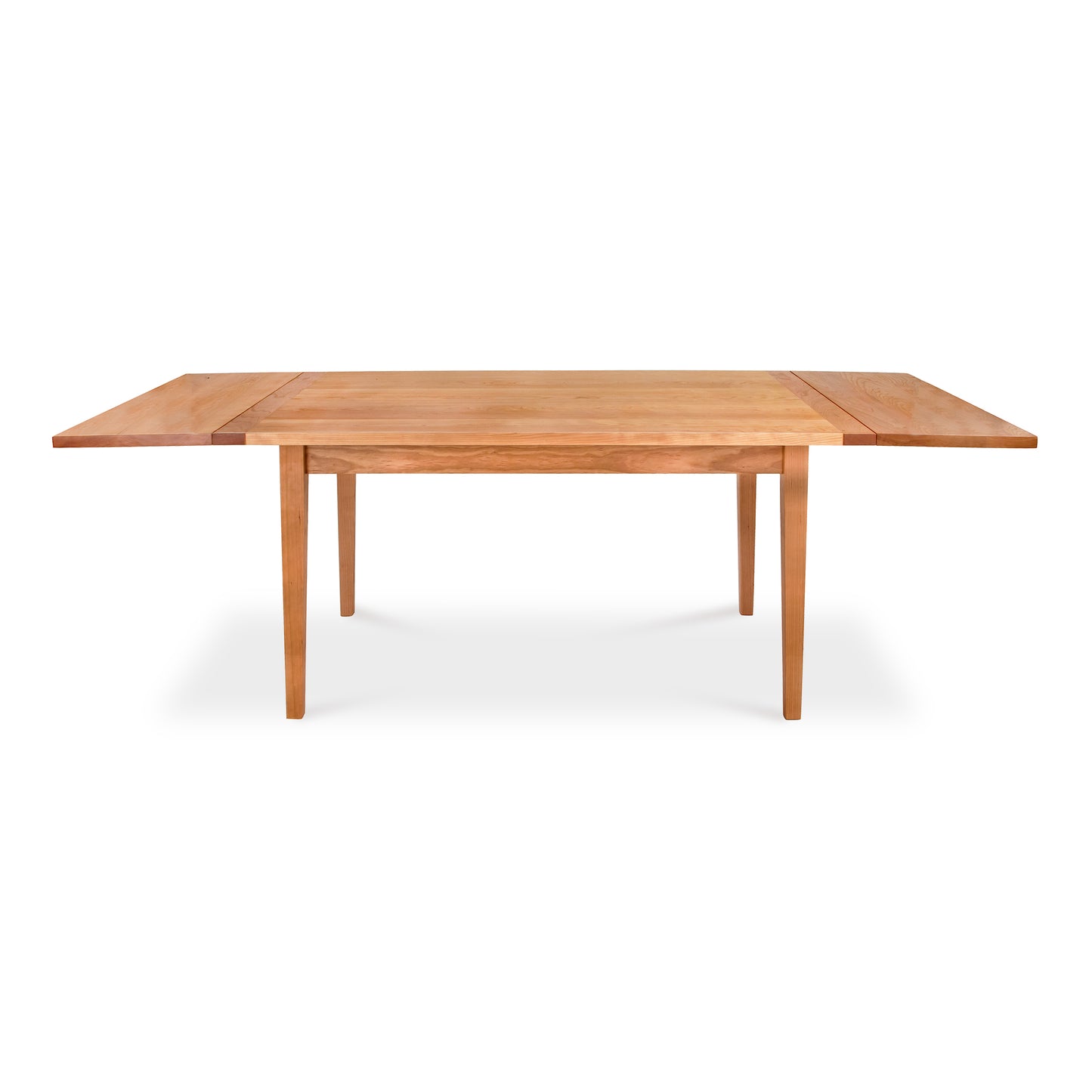 Vermont Shaker Harvest Extension Dining Table by Maple Corner Woodworks in sustainably harvested wood, with a rectangular design, straight legs, and extended leaves.
