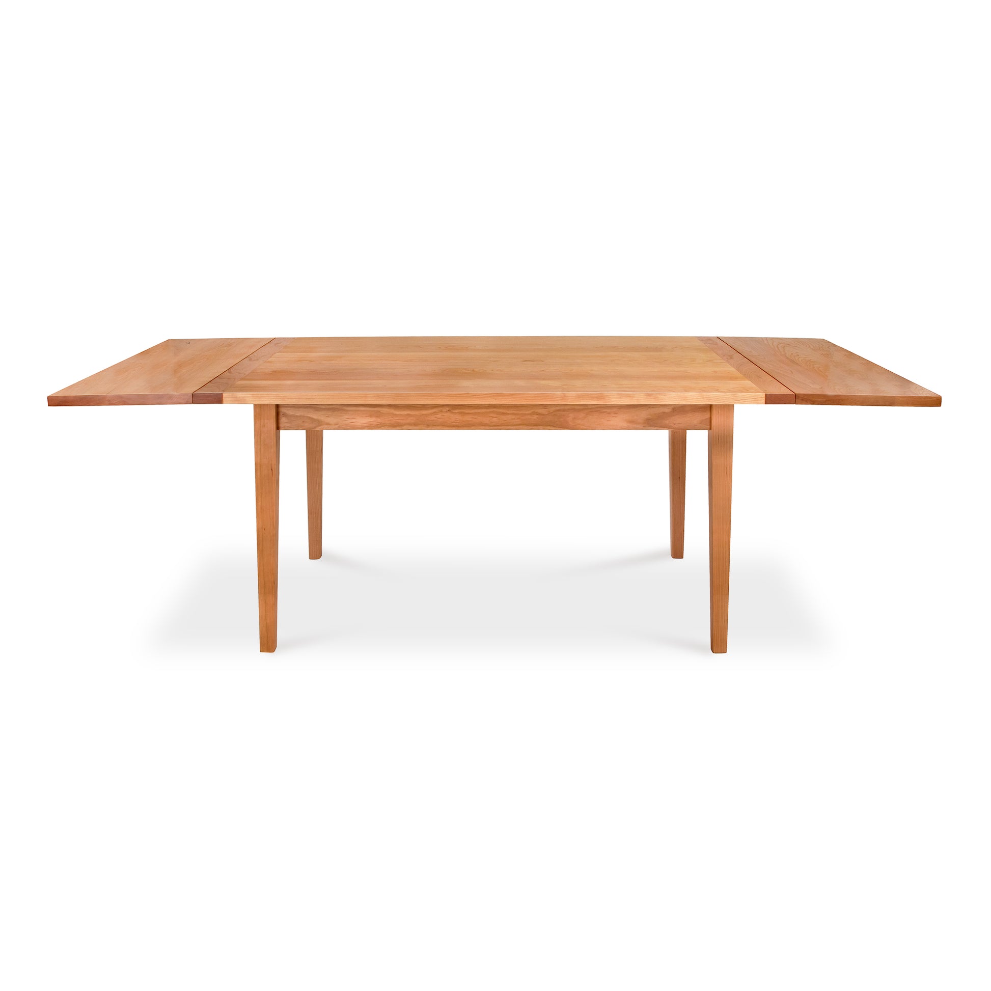Vermont Shaker Harvest Extension Dining Table by Maple Corner Woodworks in sustainably harvested wood, with a rectangular design, straight legs, and extended leaves.