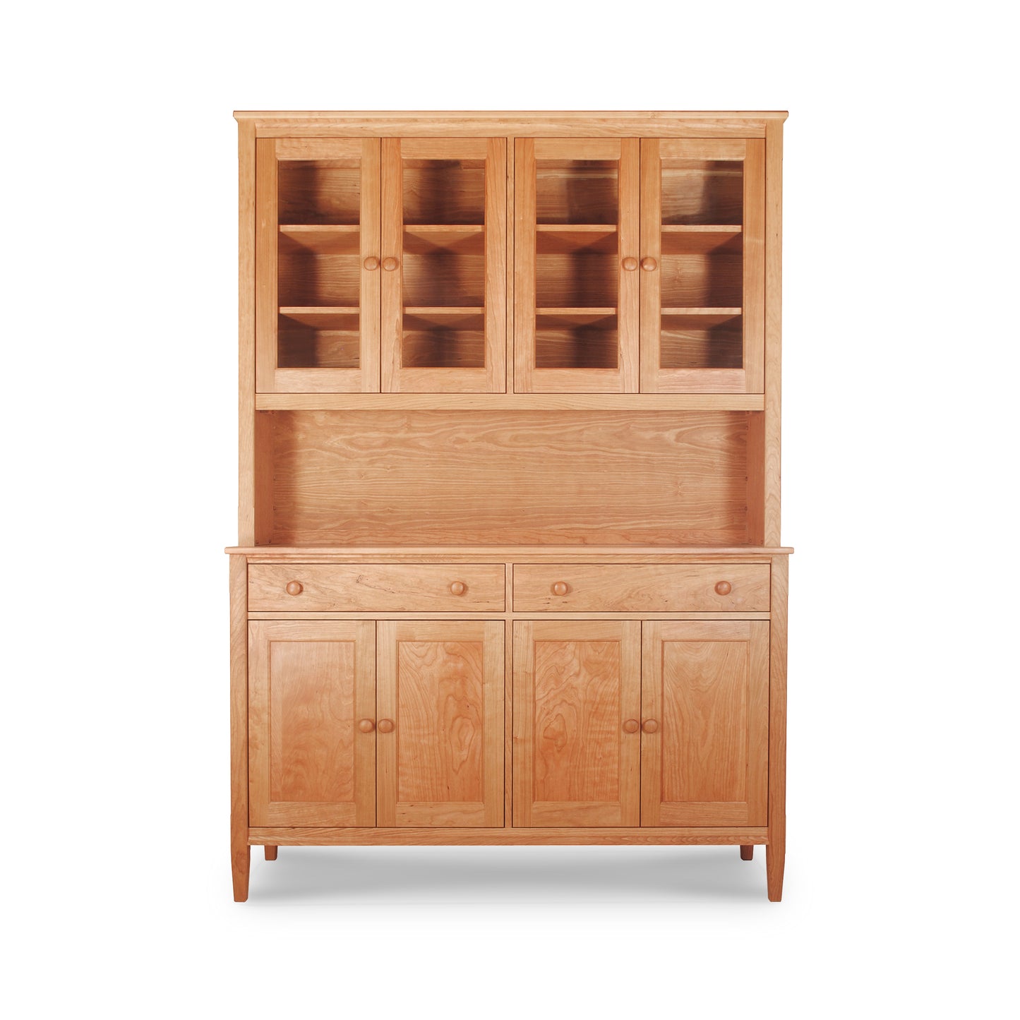Vermont Shaker Large China Cabinet by Maple Corner Woodworks, crafted from natural cherry hardwood, featuring glass-paneled upper cabinets with lower drawers and cupboard doors.