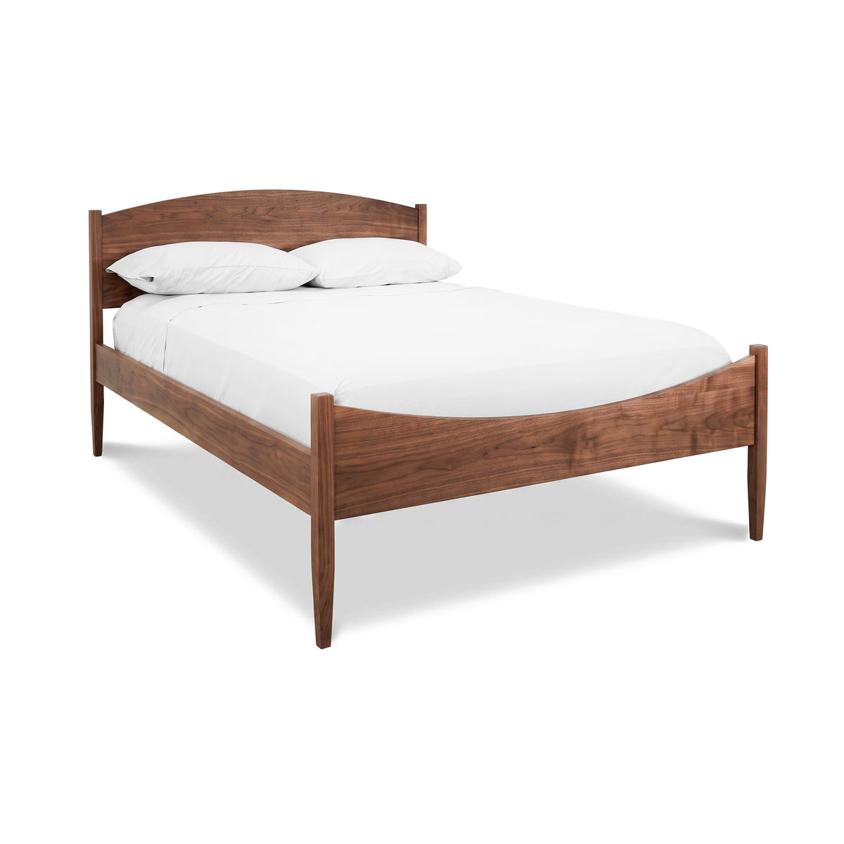 Vermont Shaker Moon Bed by Maple Corner Woodworks with signature curved headboard and minimal white bedding, crafted in Vermont.