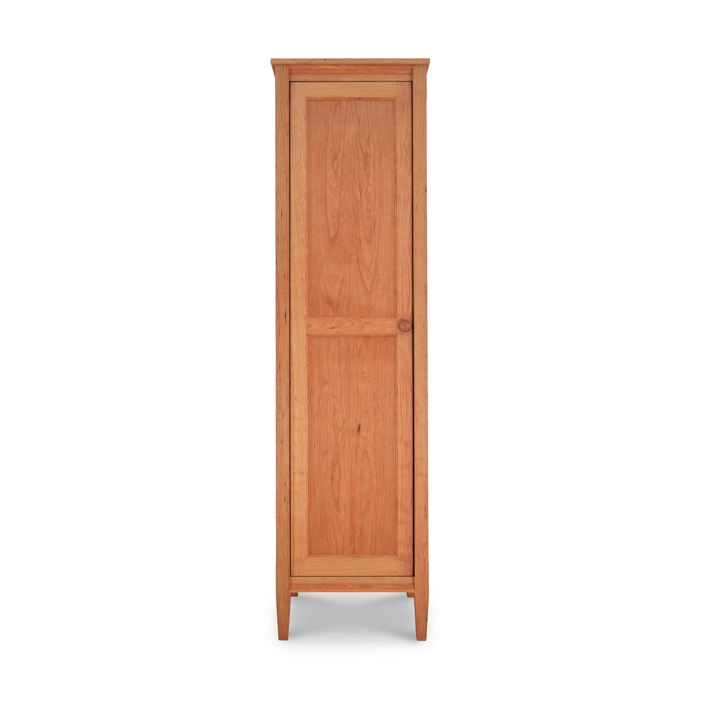 A Vermont Shaker Narrow Bookcase with Mirror by Maple Corner Woodworks, featuring a closed single door, a simple design, and a natural wood finish, isolated on a white background.