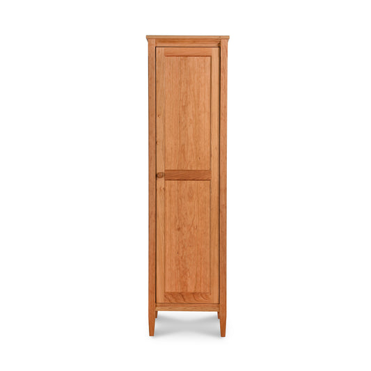 Vermont Shaker Narrow Bookcase by Maple Corner Woodworks highlighting its solid wood craftsmanship, classic design, single door, mirror feature, and natural finish.