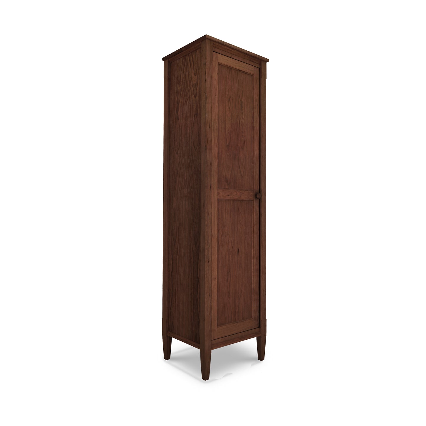 Vermont Shaker Narrow Bookcase with Mirror by Maple Corner Woodworks, a tall slender wooden cabinet with a single door and small round knob, standing on four legs.