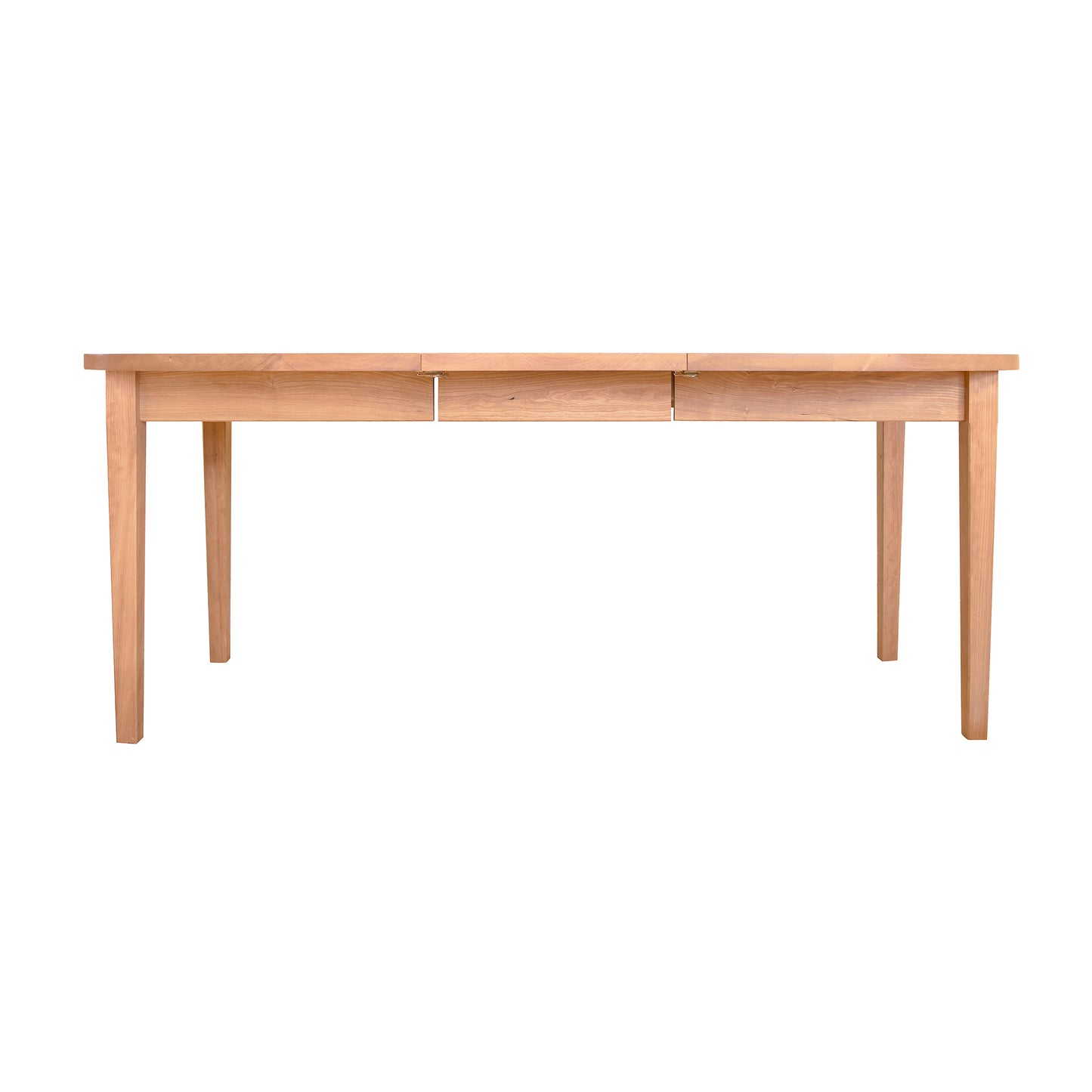 A Vermont Shaker Oval Extension Dining Table by Maple Corner Woodworks, with a rectangular top and four legs, displayed against a plain white background. The table features a minimalist design with a natural wood finish, crafted from sustainably harvested wood.