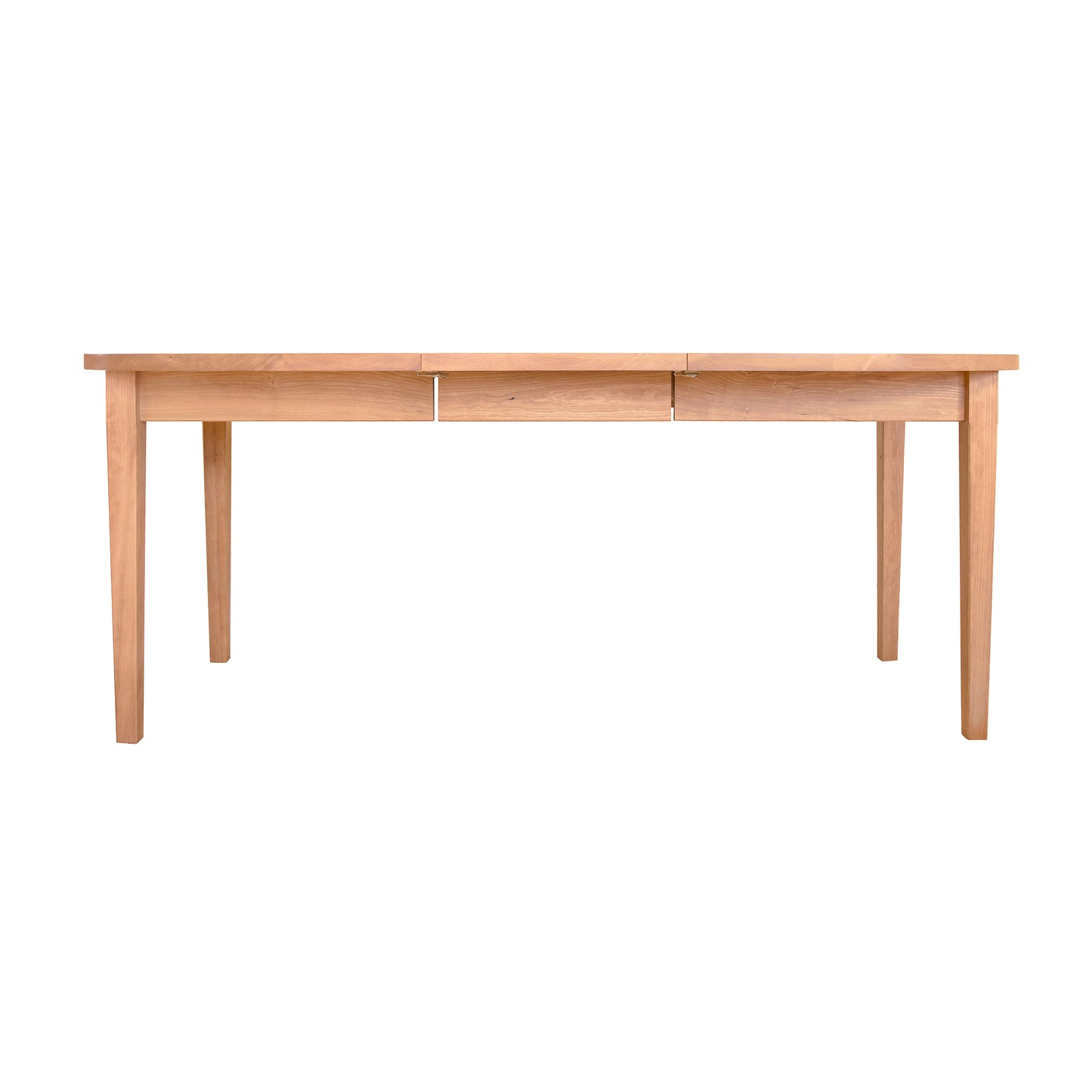 The Vermont Shaker Oval Extension Dining Table by Maple Corner Woodworks, featuring an elegant oval top and four straight legs, crafted from sustainably harvested wood.