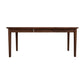A Vermont Shaker Oval Extension Dining Table by Maple Corner Woodworks, with an oval top and four legs, isolated on a white background. The table is crafted in a dark brown finish.