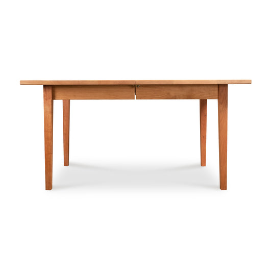 Vermont Shaker Rectangular Extension Dining Table by Maple Corner Woodworks, crafted in solid hardwood with classic lines and expert American craftsmanship.