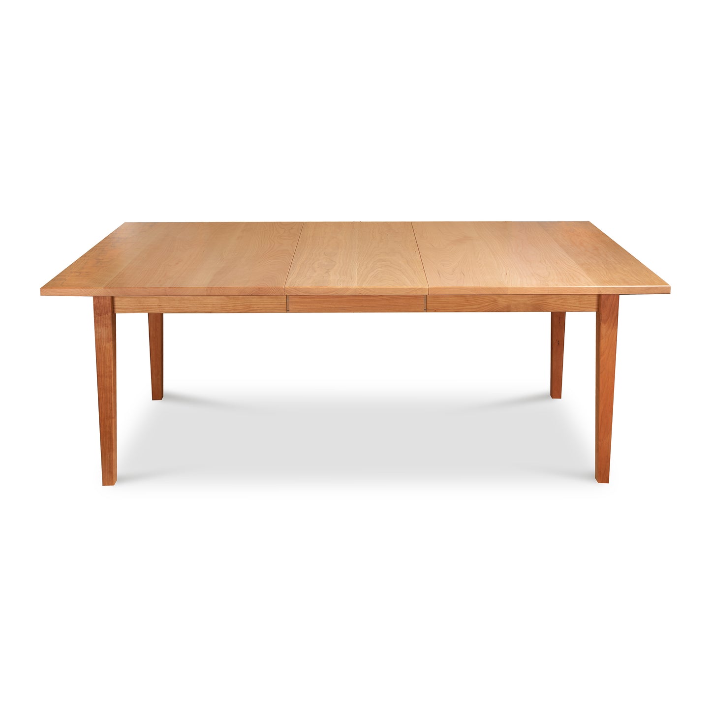 Vermont Shaker Rectangular Extension Dining Table by Maple Corner Woodworks with straight legs and a natural light wood finish crafted from sustainably harvested materials.