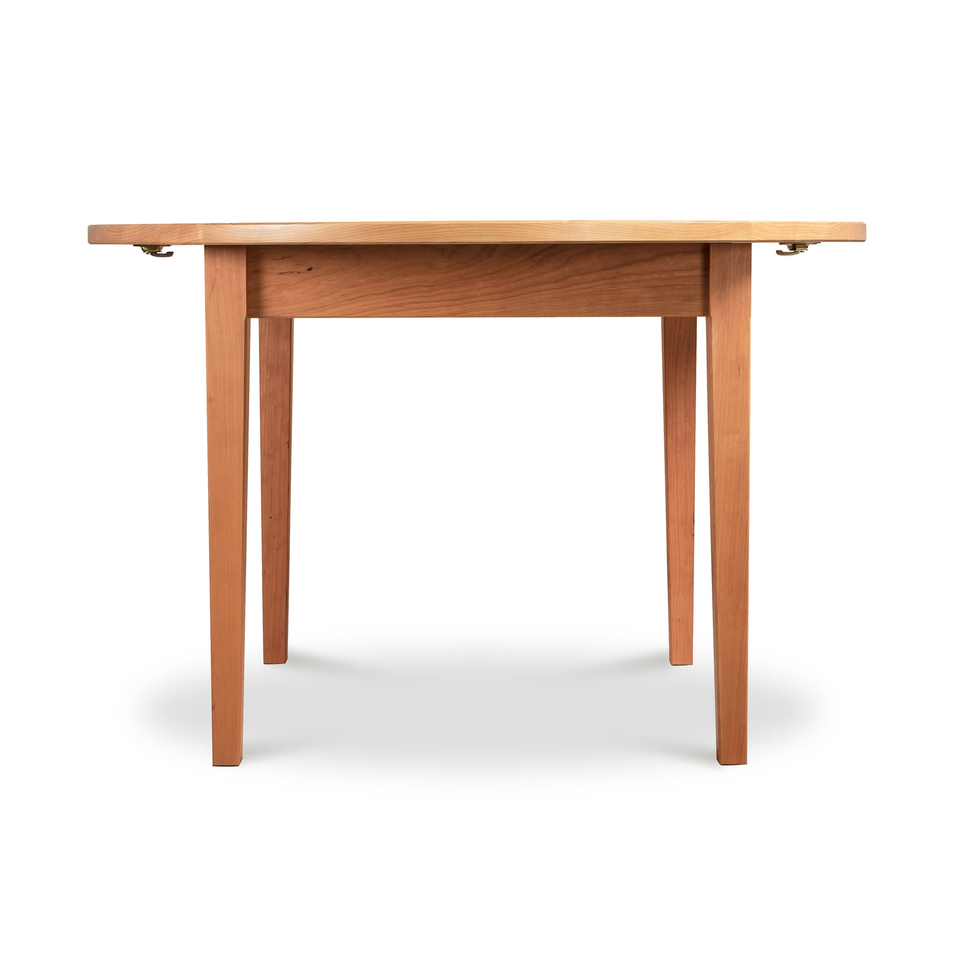 A Vermont Shaker Round Extension Table with a smooth rectangular top and four legs, handcrafted by Maple Corner Woodworks in Vermont, viewed from the front against a plain white background. The table features simple, clean lines and subtle wood grain texture.