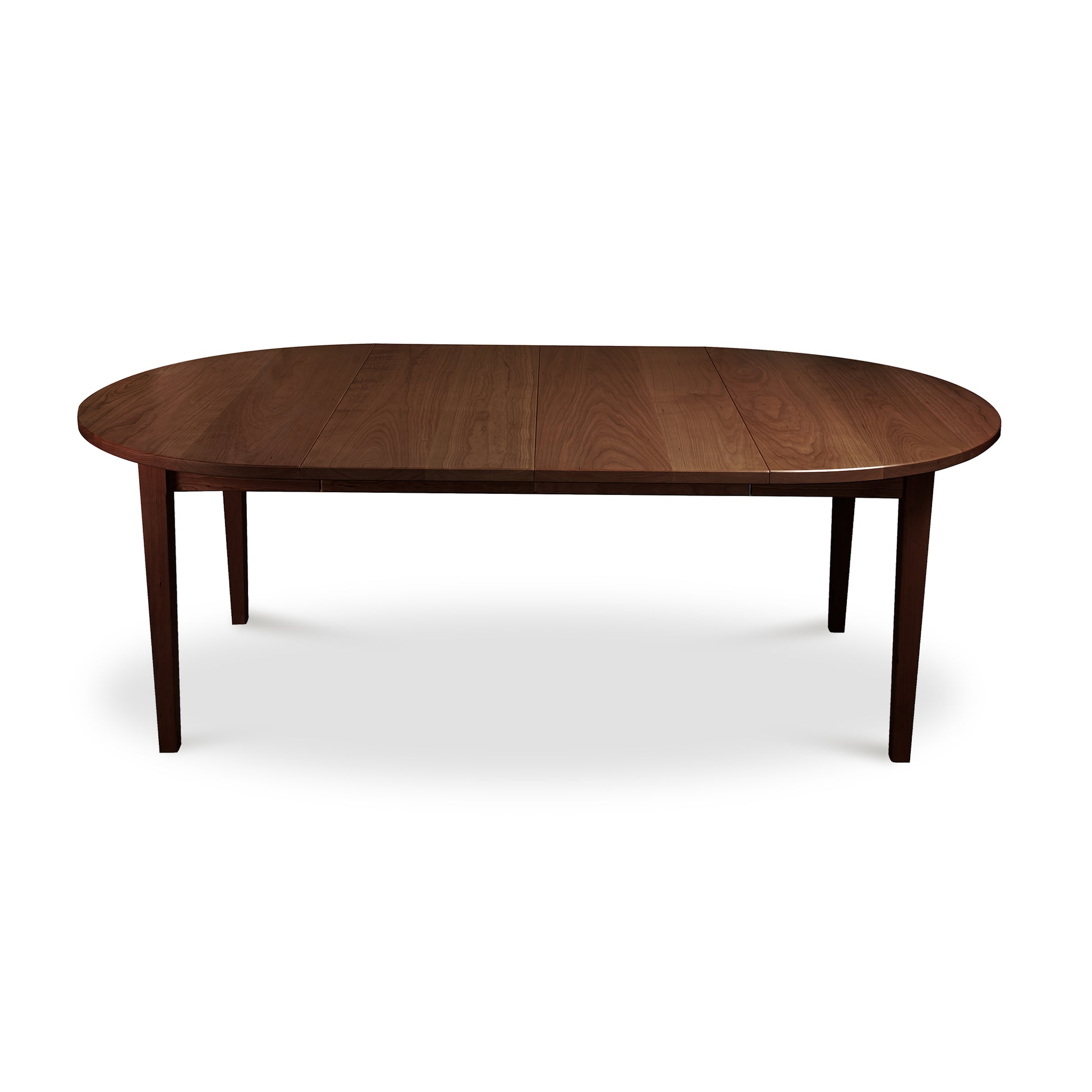 Vermont Shaker Round Extension Table by Maple Corner Woodworks, crafted from eco-friendly wood with elegant four-leg design