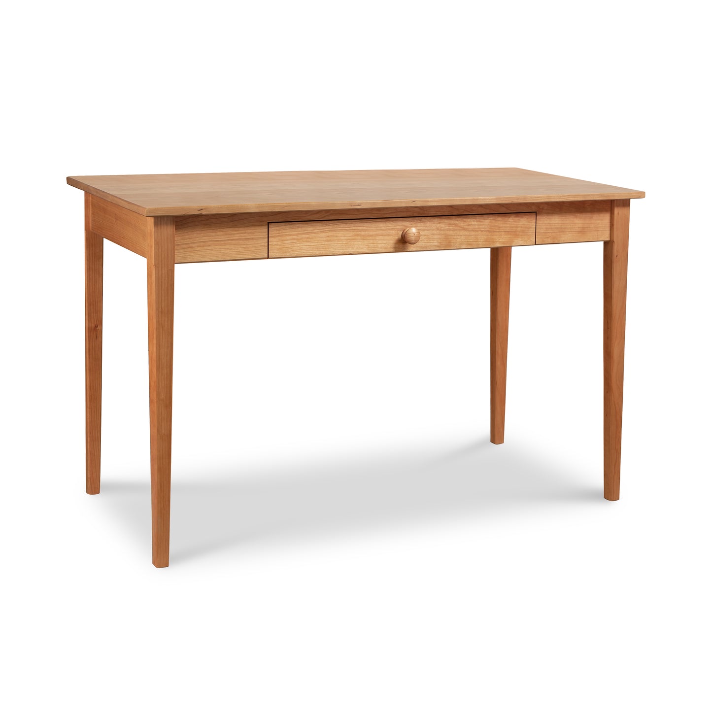 Vermont Shaker Writing Desk by Maple Corner Woodworks with four tapered legs and a central drawer, crafted in hardwood.