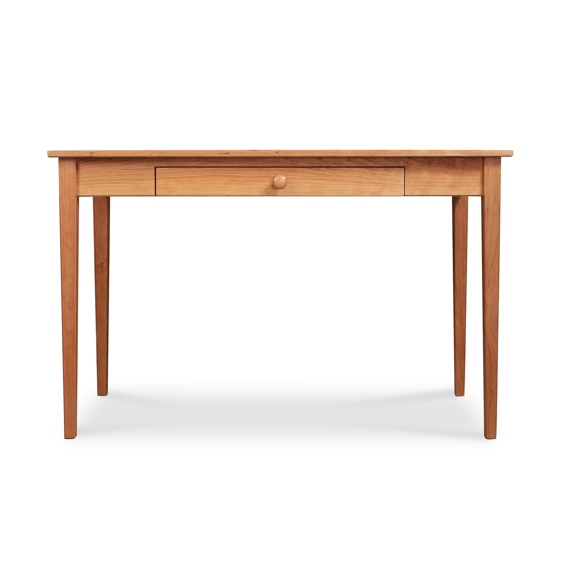 A Maple Corner Woodworks Vermont Shaker Writing Desk with a single central drawer, featuring round knob handle, against a white background.