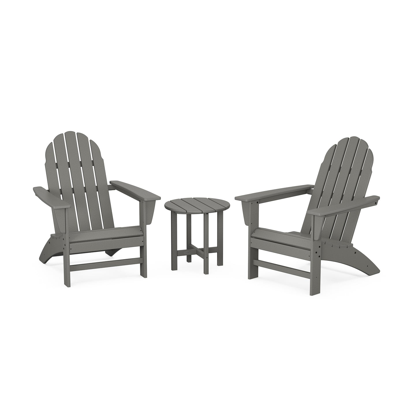Gray POLYWOOD Vineyard Adirondack chairs with a matching round table, made of durable POLYWOOD® lumber.