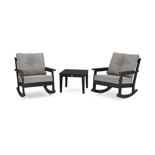 Gray and black POLYWOOD Vineyard rockers with a small black square table.