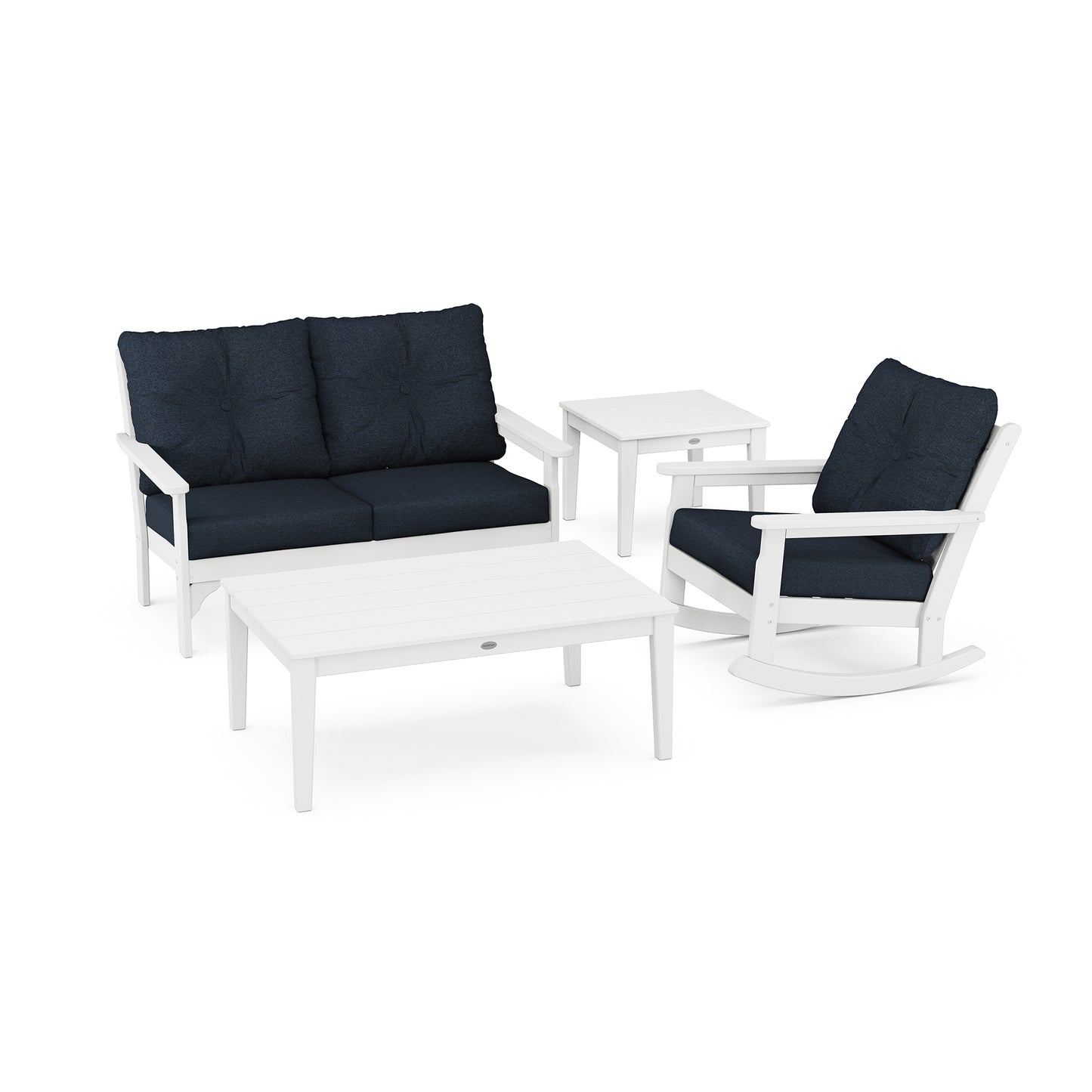 A modern POLYWOOD Vineyard 4-Piece Deep Seating Rocker Set on a white background, including a white sofa with navy blue cushions, two matching armchairs, and a rectangular coffee table.