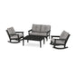 A POLYWOOD Vineyard 4-Piece Deep Seating Rocking Chair Set on a white background, including two rocking chairs, a loveseat, and a coffee table, all in black with gray cushions.