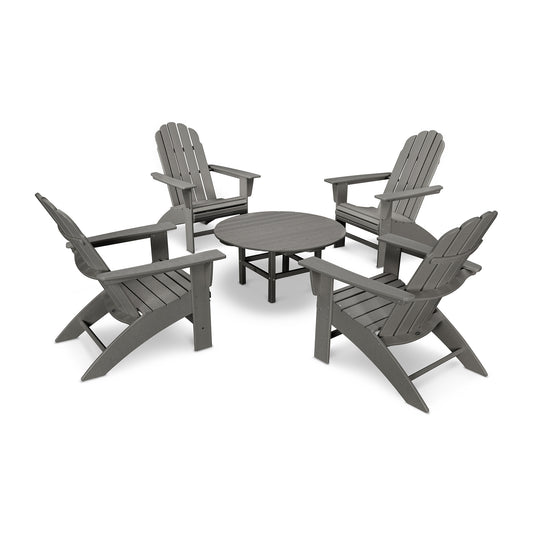 Five-piece Vineyard Adirondack set by POLYWOOD with oversized chairs and a sleek round gray table.