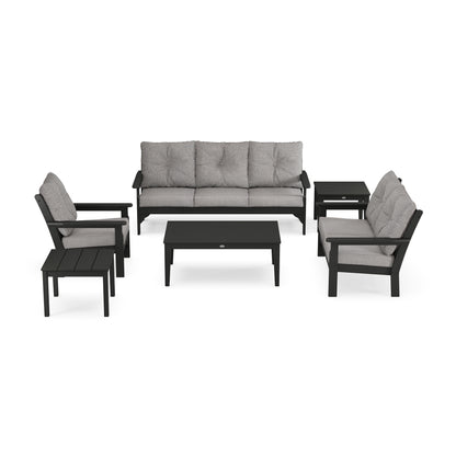 A modern POLYWOOD Vineyard 6-Piece Deep Seating Set, including a sofa with cushions, two armchairs with cushions, a coffee table, and a side table, all in a matching dark gray color scheme.
