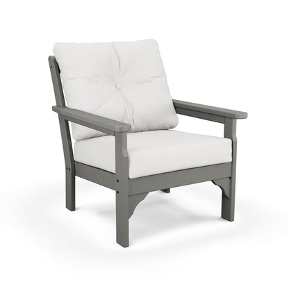 A modern POLYWOOD Vineyard Deep Seating Chair made of gray composite material, featuring a thick white all-weather fabric cushion and a matching backrest pillow, isolated on a white background.