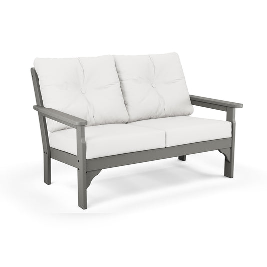 POLYWOOD Vineyard Deep Seating Settee with weather-resistant gray and white cushions for outdoor luxury.