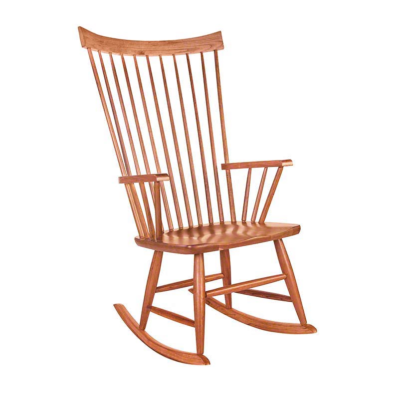 A wooden rocking chair on a white background.