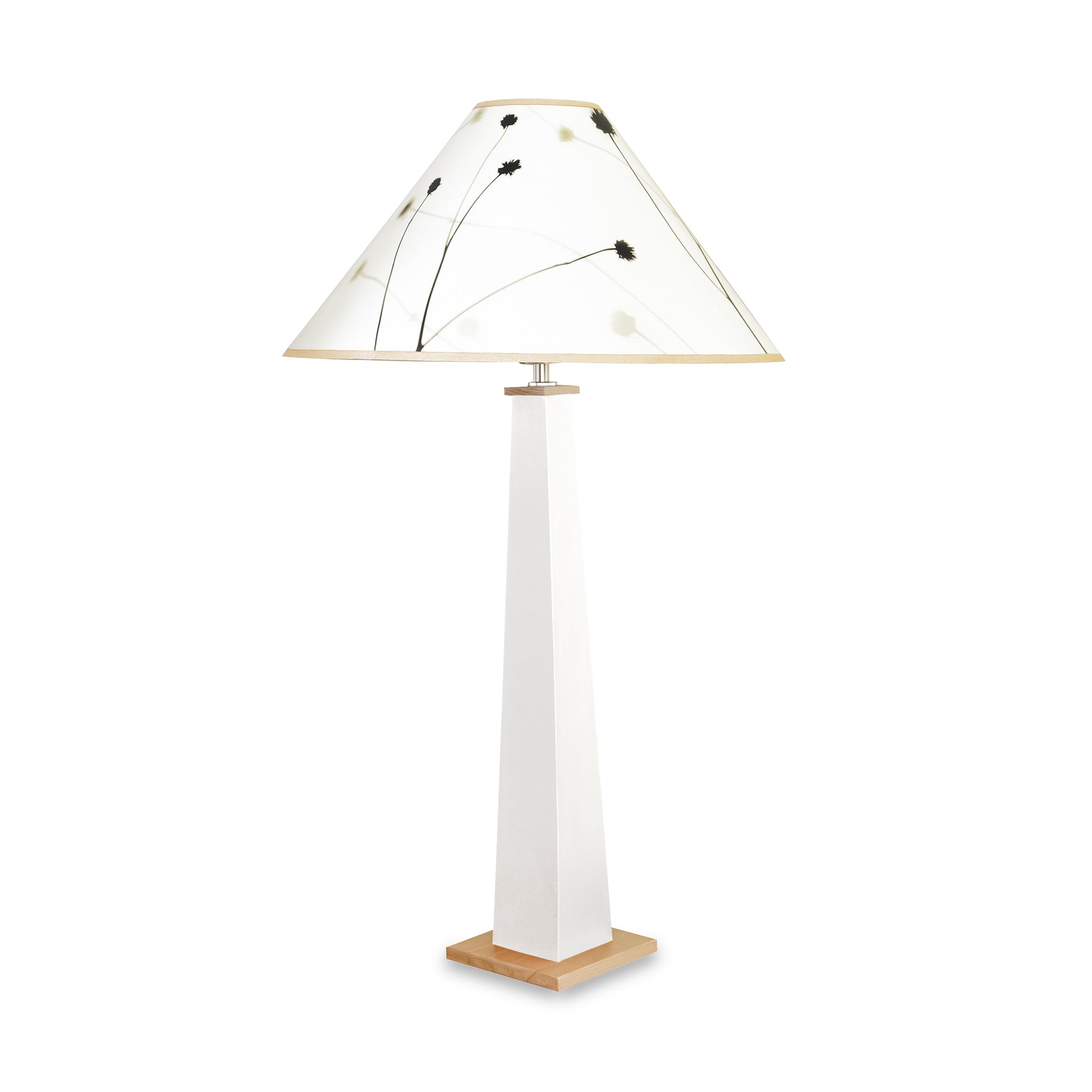 Winter Hill Table Lamp by Rock River Studio with a white square base and conical shade featuring a subtle black floral design.