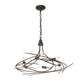 The Hubbardton Forge Wisp 6-Light Chandelier is an elegant silhouette made of metal with a black finish.