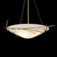 A Hubbardton Forge Wisp pendant light with a white glass shade hanging from a black background.