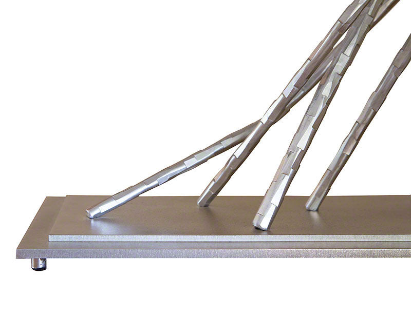 Brindille Table Lamp by Hubbardton Forge with angled rods and dark smoke finish, showcasing its elegant handcrafted metal design.