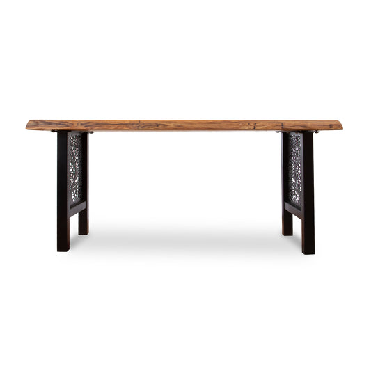 Live-edge oak bench with a natural top and intricate powder-coated black metal legs by Mike Messer, showcased as a floor model.