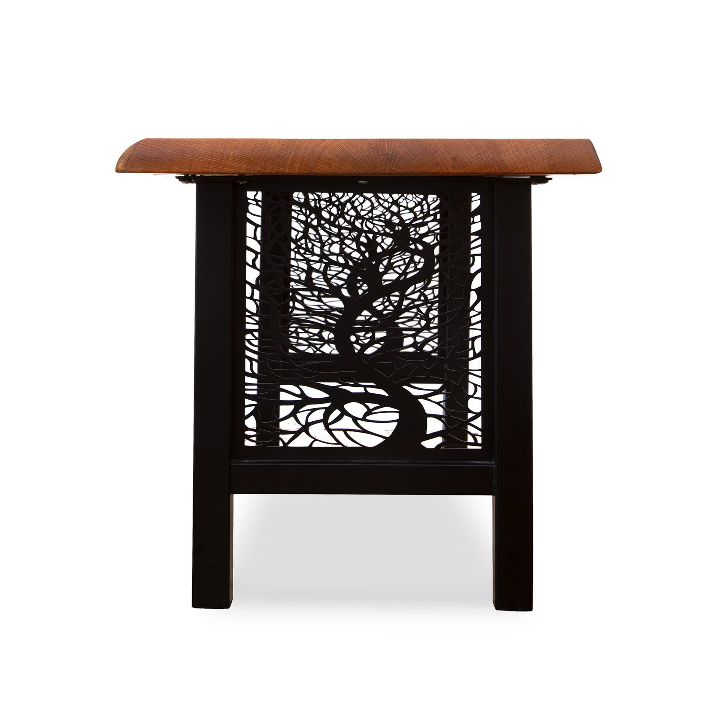 Small wooden bench featuring a custom lattice design with a swirling tree pattern on the side, crafted by Mike Messer.