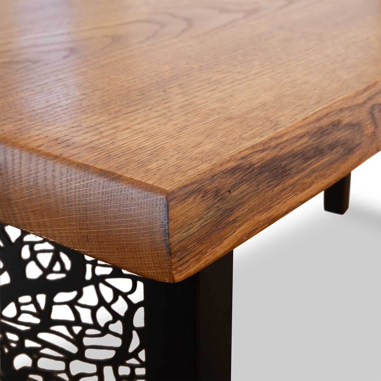 Mike Messer Live-Edge Oak Artisan Bench showcasing a beveled edge and unique metal base with abstract cut-out design.