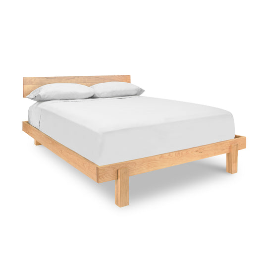 Modern American platform bed in king size by Vermont Furniture Designs, featuring a solid hardwood frame and headboard in a sleek, minimalist style.
