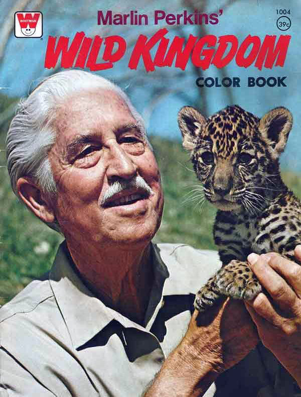 A man holding a leopard on the cover of a book.