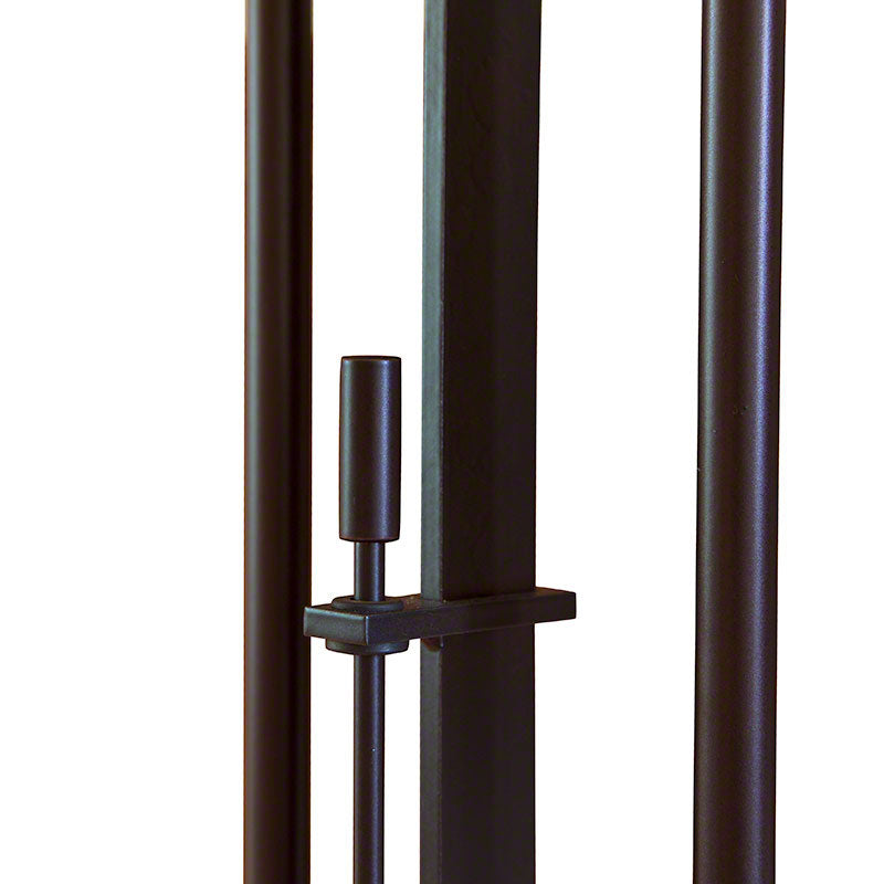 Close-up of the Rook Twin Floor Lamp by Hubbardton Forge, highlighting the metal rod, adjustable handle, and sliding bracket design.