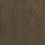 A close up image of a dark wood floor.