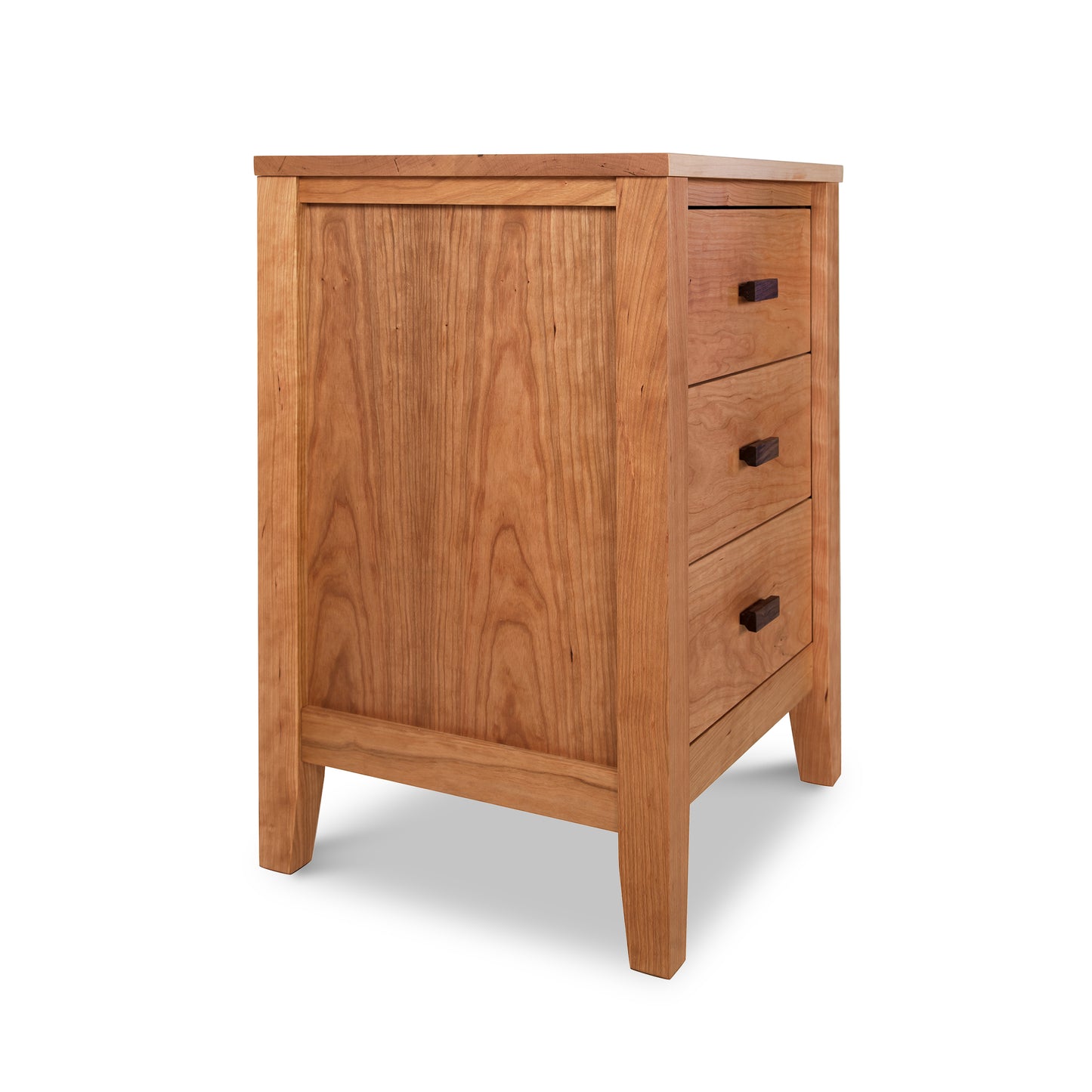 A wooden nightstand with three drawers.