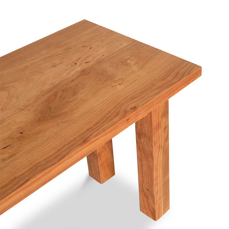 A wooden table with two legs on a white background.