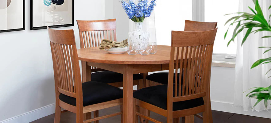 Small cherry wood dining set with round table and four chairs