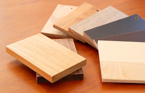 Fanned-out samples showcasing various colors and grains of high-quality American-made wood.