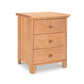 An American countryside-inspired Lyndon Furniture solid wood nightstand with three drawers.