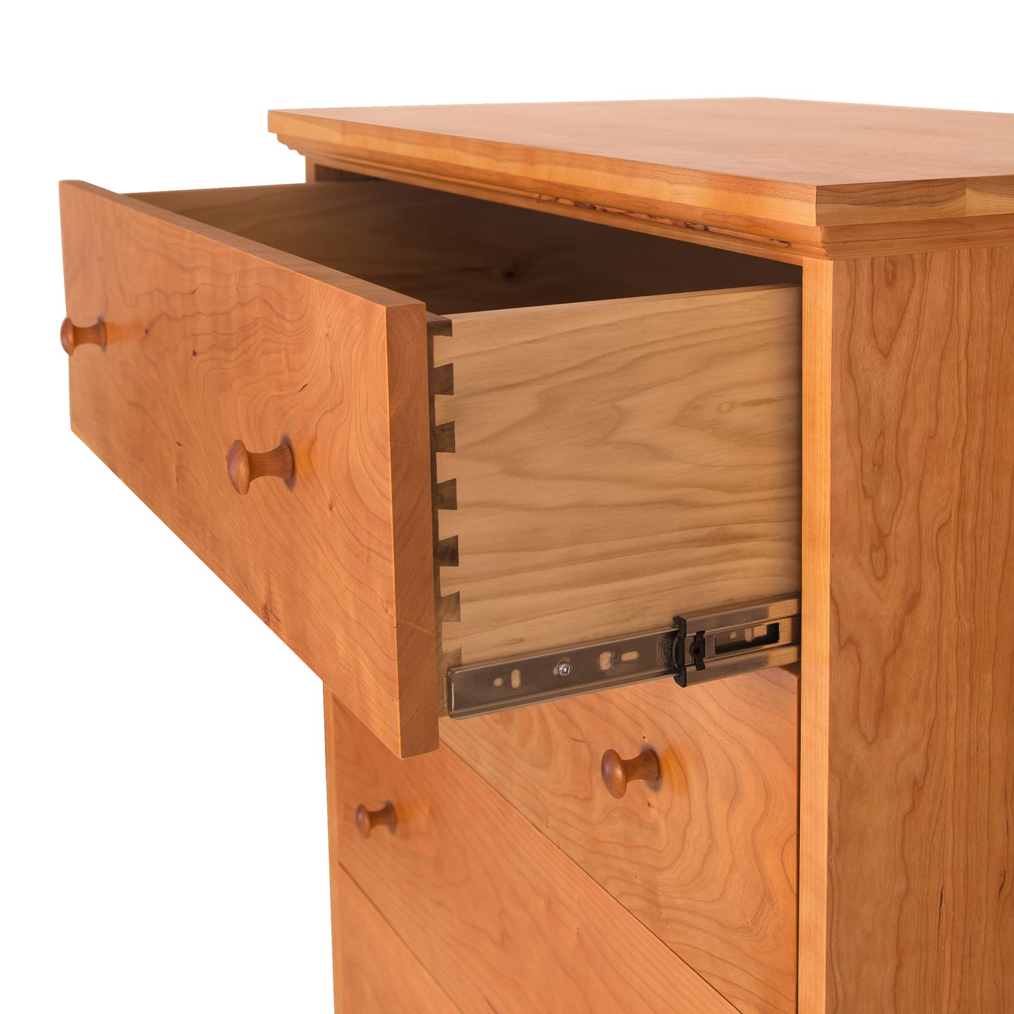 A Lyndon Furniture American Country 4-Drawer Chest with a drawer open, made of solid wood.