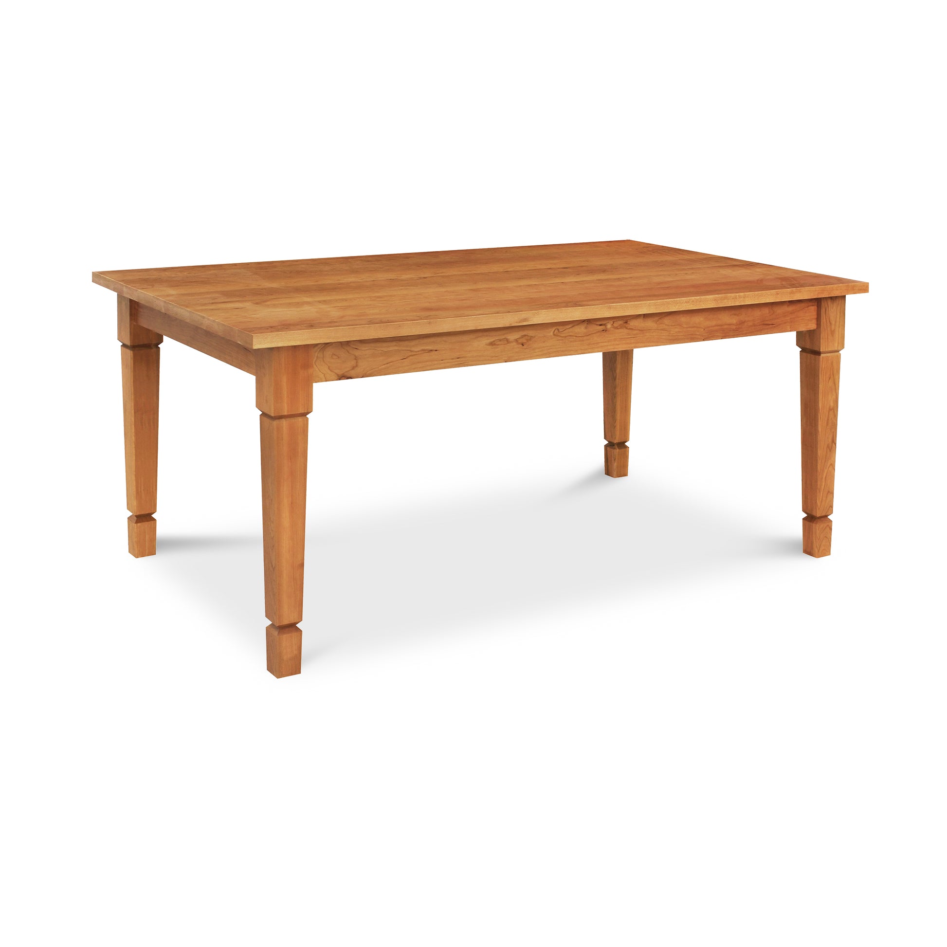 A American Craftsman Solid Top Dining Table from Lyndon Furniture with four sturdy legs on a white background, made of sustainably sourced hardwoods.
