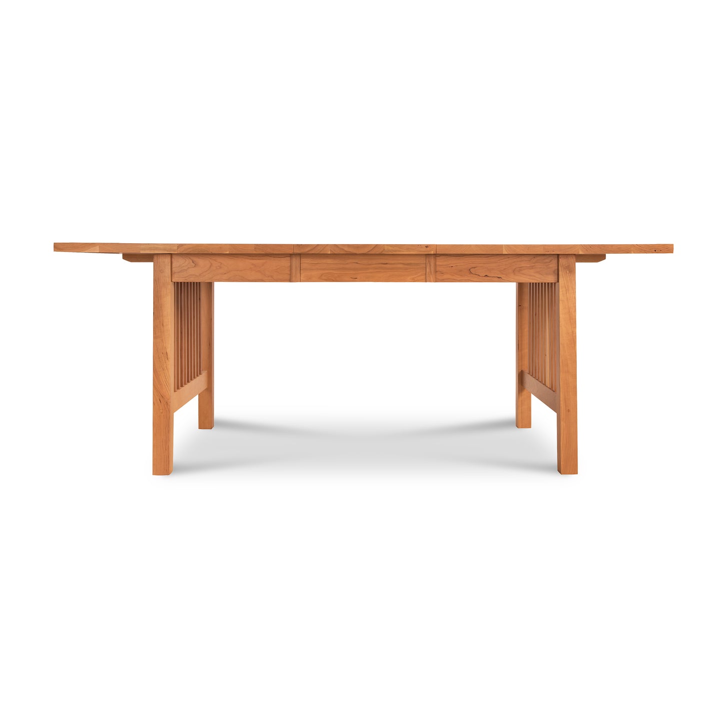 An Lyndon Furniture American Mission Extension dining table crafted from solid natural wood, featuring two convenient drawers for storage.