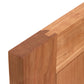 Close-up of a dovetail joint connecting two pieces of sustainably harvested wood, highlighting the precise cuts and smooth finish of the American Shaker 1-Drawer Nightstand with Door from Maple Corner Woodworks against a white background.