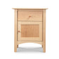 Handmade American Shaker nightstand by Maple Corner Woodworks, featuring 1 drawer and 1 door in natural hardwood.
