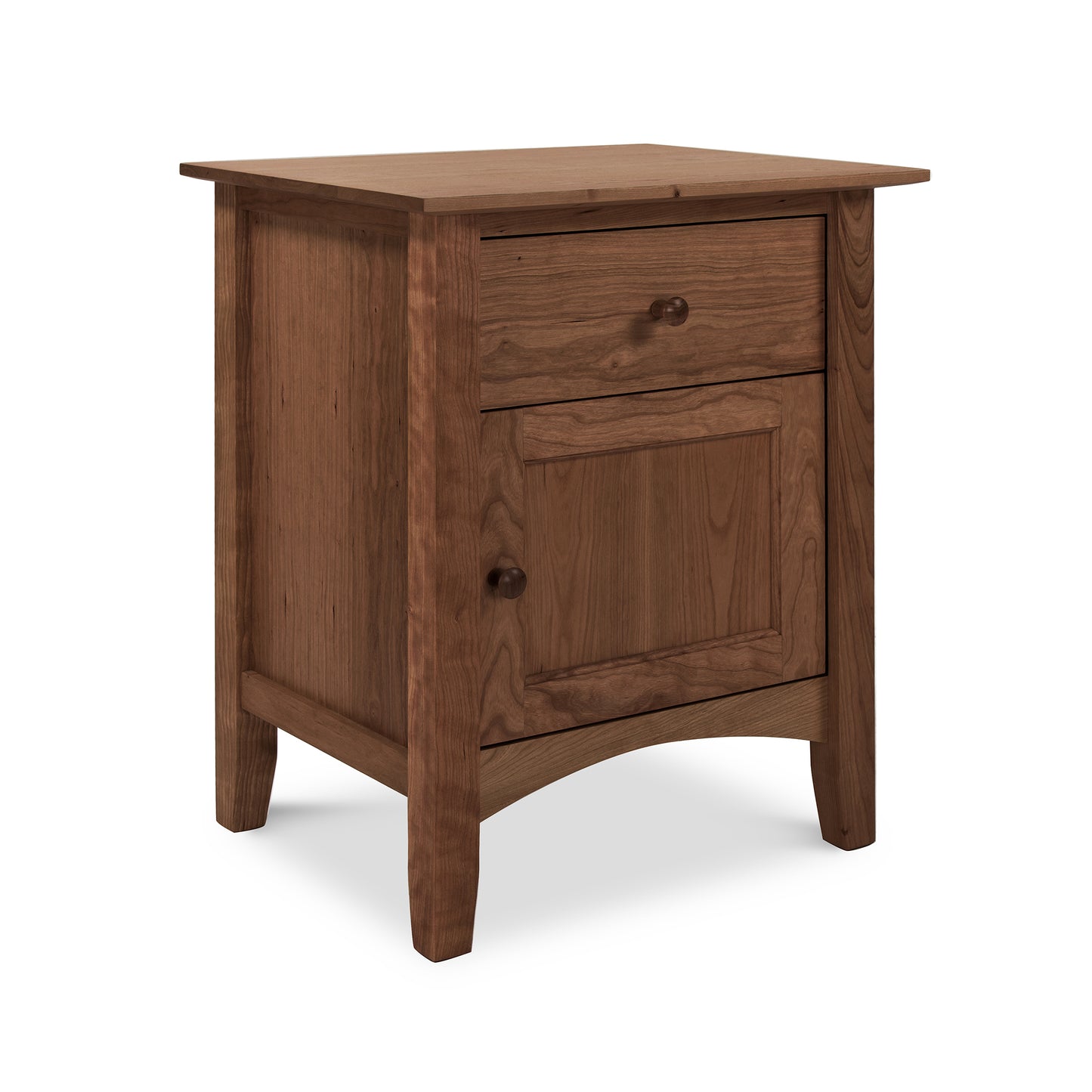 A small wooden American Shaker 1-Drawer Nightstand with Door showcasing Maple Corner Woodworks craftsmanship and natural cherry wood.