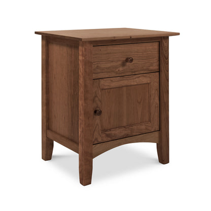 American Shaker 1-Drawer Nightstand with Door by Maple Corner Woodworks, highlighting expert Vermont craftsmanship with its sleek wooden design, featuring a drawer and cabinet door, simple knobs, and a smooth finish in sustainable materials.